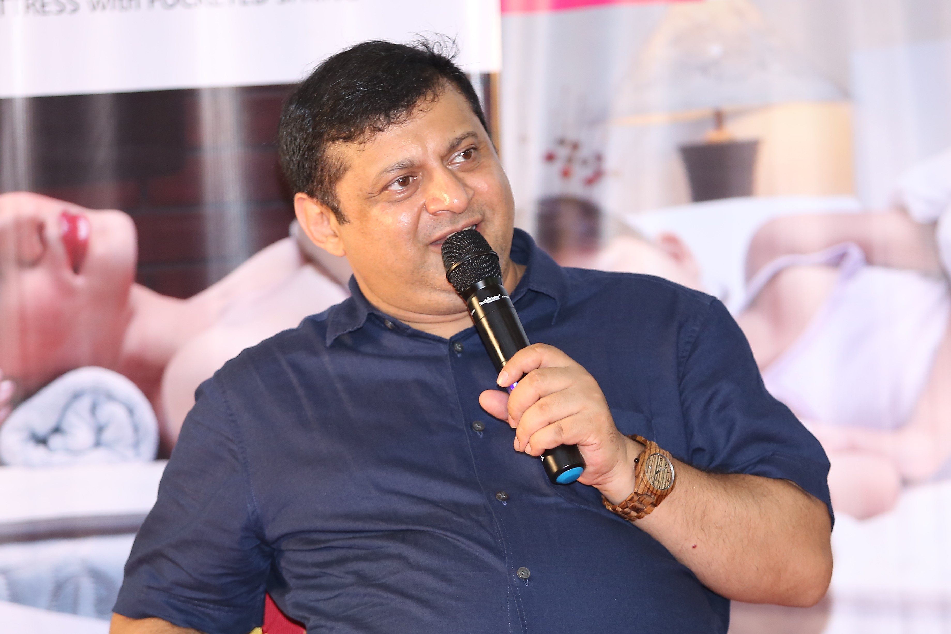 Deepak Thimaya speaking at an event